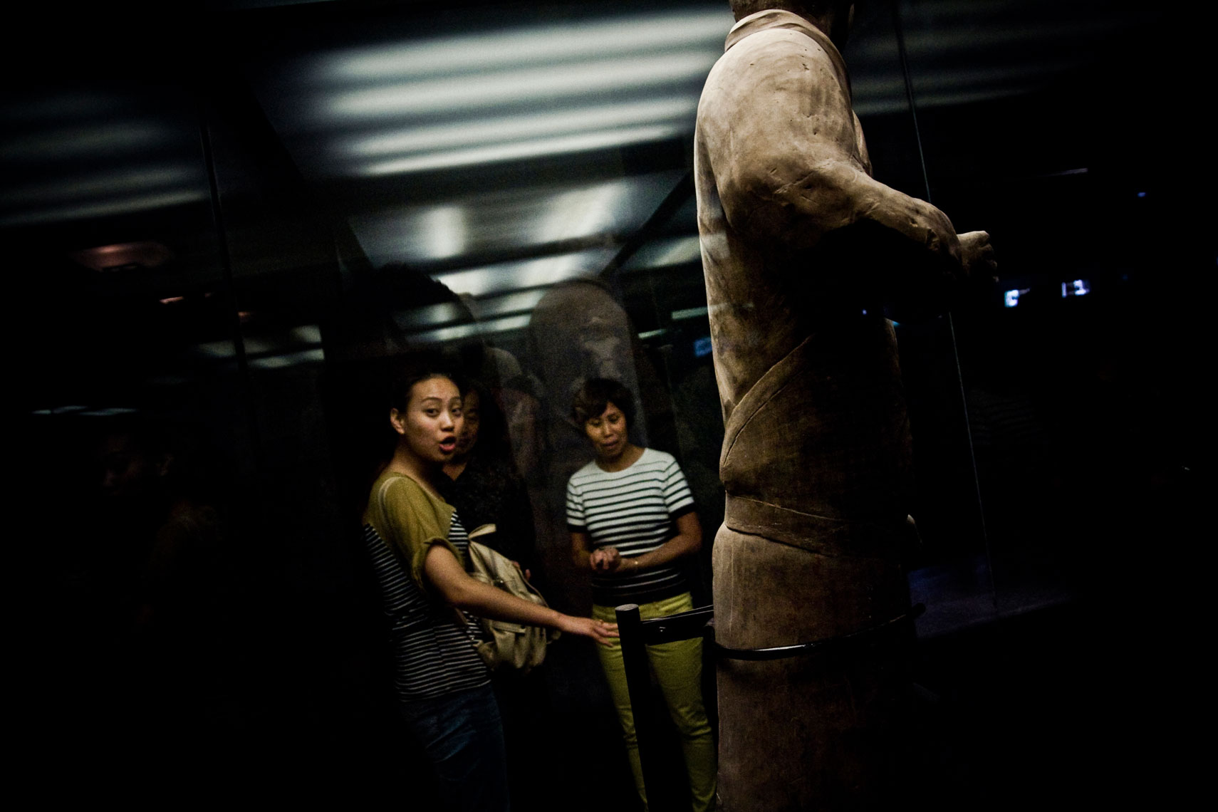 CHINA. Xi'an, Shaanxi Province, September 2012. Chinese tourists visit the Terracotta Army site.